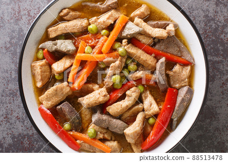 Igado Pork and Liver Ragout Asian Food closeup in the plate. Horizontal top view Igado Pork and Liver Ragout Asian Food closeup in the plate. Horizontal top view 88513478