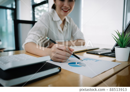 usiness man investment consultant analyzing company annual financial report balance sheet statement working with documents graphs. Concept picture of business, market, office, tax usiness man investment consultant analyzing company annual financial report balance sheet statement working with documents graphs. Concept picture of business, market, office, tax 88513913