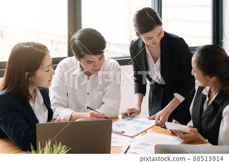 Asian business adviser meeting to analyze and discuss the situation on the financial report in the meeting room.Investment Consultant,Financial advisor and accounting concept Asian business adviser meeting to analyze and discuss the situation on the financial report in the meeting room.Investment Consultant,Financial advisor and accounting concept 88513914