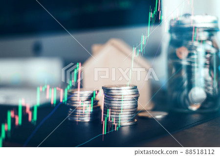 double exposure Working on a computer and graphing cryptocurrencies 88518112