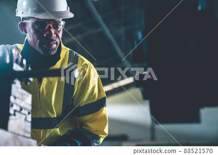 Factory worker or engineer do machine job in adept manufacturing workshop Factory worker or engineer do machine job in adept manufacturing workshop 88521570