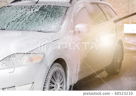 car washing with high pressure cleaning in carwash 88523210