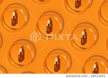 Amber bottle. Laboratory glass petri dish with pipette of water, serum, oil, beauty product. Natural medicine, cosmetic research, bio science. Pattern. Skincare and analysis concept. Dermatology Amber bottle. Laboratory glass petri dish with pipette of water, serum, oil, beauty product. Natural medicine, cosmetic research, bio science. Pattern. Skincare and analysis concept. Dermatology 88523641