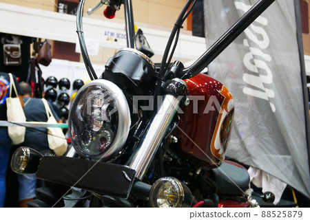 SELANGOR, MALAYSIA - 8 APRIL 2022: Branded motorcycle classic headlights installed on custom motorcycles. The motorcycle was displayed to the public in a large showroom. SELANGOR, MALAYSIA - 8 APRIL 2022: Branded motorcycle classic headlights installed on custom motorcycles. The motorcycle was displayed to the public in a large showroom. 88525879