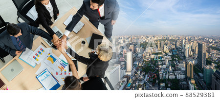 Happy business people celebrate teamwork success in widen view Happy business people celebrate teamwork success in widen view 88529381