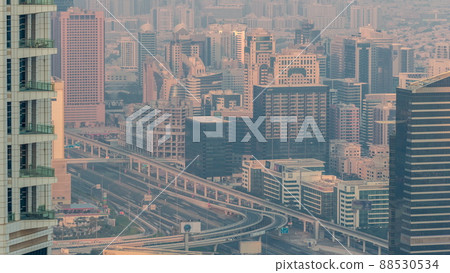 Dubai Aerial view showing al barsha heights and greens district area timelapse 88530534