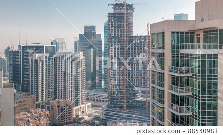 Dubai skyscrapers in business bay district timelapse. Dubai skyscrapers in business bay district timelapse. 88530981