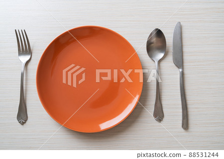 empty plate or dish with knife, fork and spoon empty plate or dish with knife, fork and spoon 88531244