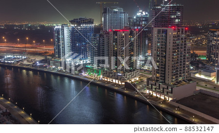 Towers at the Business Bay aerial night timelapse in Dubai, United Arab Emirates Towers at the Business Bay aerial night timelapse in Dubai, United Arab Emirates 88532147