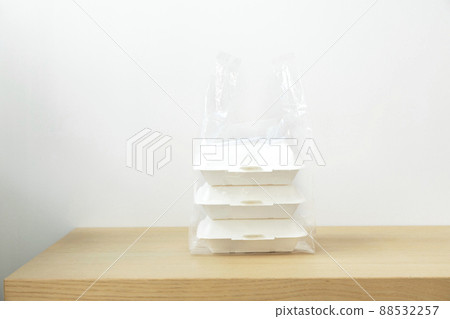 Food containers box on wood table. Food delivery service. Food containers box on wood table. Food delivery service. 88532257