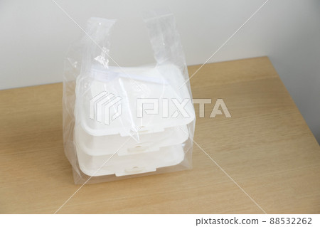 Food containers box on wood table. Food delivery service. 88532262