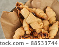 Russian slavic traditional pastry called roguelikes. Cakes bagels. Crispy croissants. Food on grey background, Closeup view 88533744