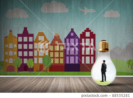 Businessman trapped in bulb Businessman trapped in bulb 88535281