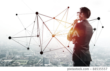 Concept of business success and control with confident boss against cityscape background Concept of business success and control with confident boss against cityscape background 88535557