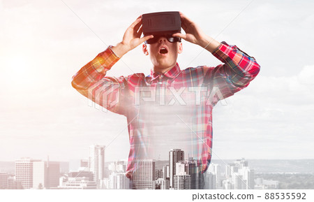 Guy wearing checked shirt and virtual mask demonstrating some emotions 88535592