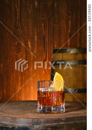 Cocktail with Monkey Shoulder blended malt scotch whisky and orange bitter Cocktail with Monkey Shoulder blended malt scotch whisky and orange bitter 88539980