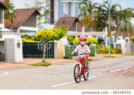 Child riding bike Child riding bike 88548450