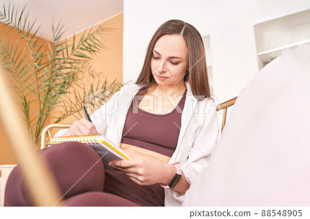 Young woman drawing neurographics indoors. Psychology treatment 88548905