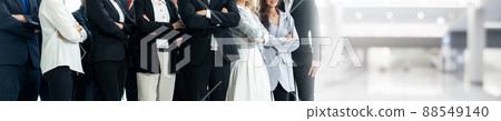 Successful business people standing together widen out Successful business people standing together widen out 88549140