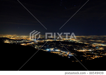 Plain illuminated partially covered by fog, soft lights Plain illuminated partially covered by fog, soft lights 88549439