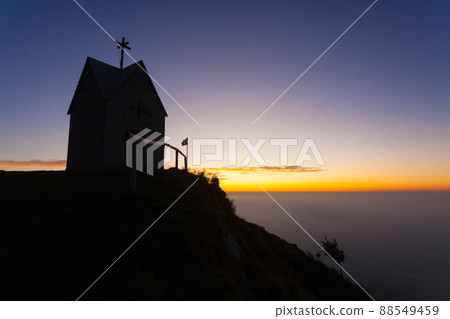 Dawn at the little church, mount Grappa landscape, Italy 88549459