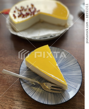 cheesecake pie lemon plate table candles yellow 88551311