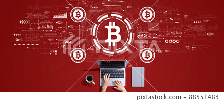 Bitcoin theme with person working with laptop 88551483