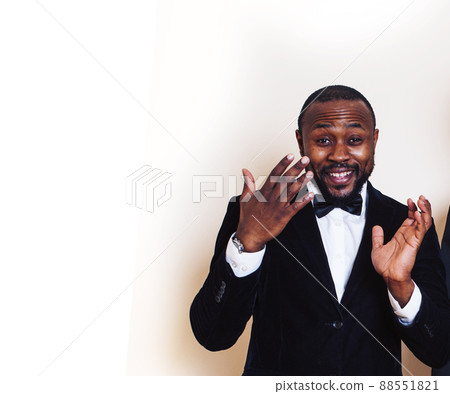 young african american guy in black suit posing happy smiling, business people concept, lifestyle modern business man copy space young african american guy in black suit posing happy smiling, business people concept, lifestyle modern business man copy space 88551821