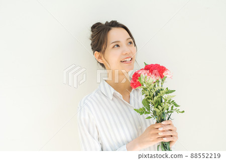 Lady with a bouquet white background Lady with a bouquet white background 88552219