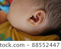 Baby's left ear 88552447