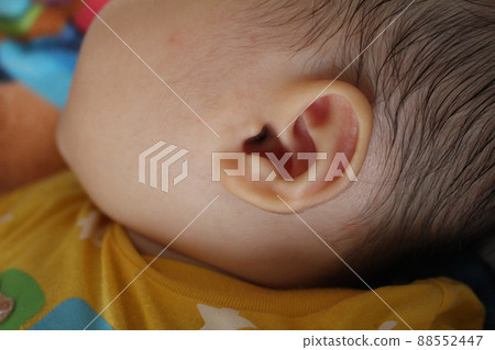 Baby's left ear 88552447