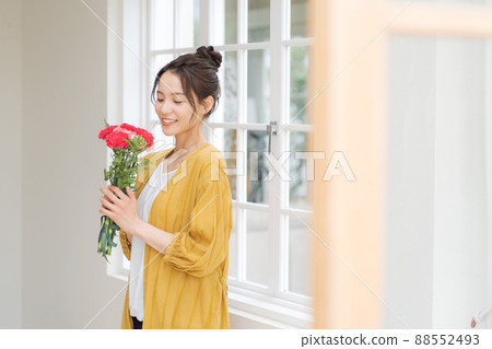 Woman with a bouquet Woman with a bouquet 88552493