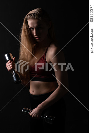 Holds as shiny a kira in beautiful her knightly dumbbells hands girl dumbbells black caucasian, for female woman from exercise and active strength, sportswear biceps. Care ABS aerobics Holds as shiny a kira in beautiful her knightly dumbbells hands girl dumbbells black caucasian, for female woman from exercise and active strength, sportswear biceps. Care ABS aerobics 88553574