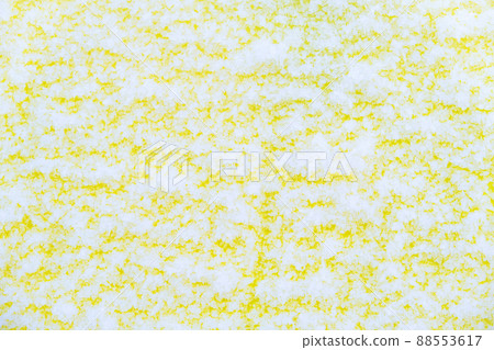 The yellow wall is covered with snow patterns 88553617