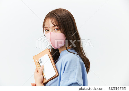 Business casual young woman with a mask 88554765