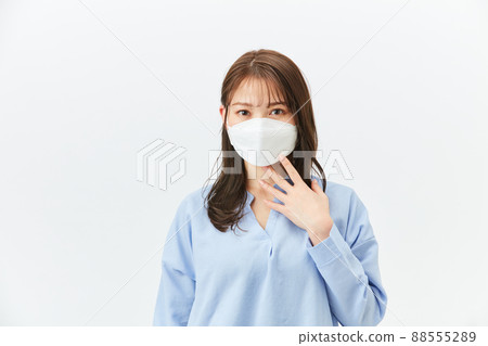 Business casual young woman with a mask 88555289