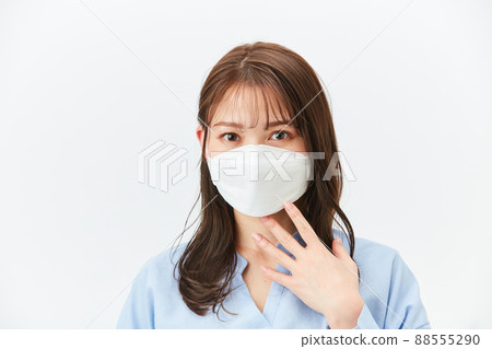 Business casual young woman with a mask 88555290