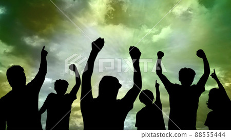 Silhouettes of protesters_green sky background_wide Silhouettes of protesters_green sky background_wide 88555444