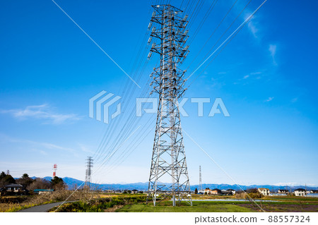 Idyllic scenery of the Kanto plain in spring with power transmission towers a-2 High contrast 88557324