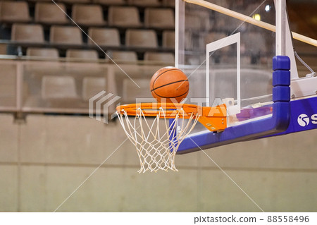 The moment the ball shot in a basketball game enters the goal or the goal net shakes The moment the ball shot in a basketball game enters the goal or the goal net shakes 88558496