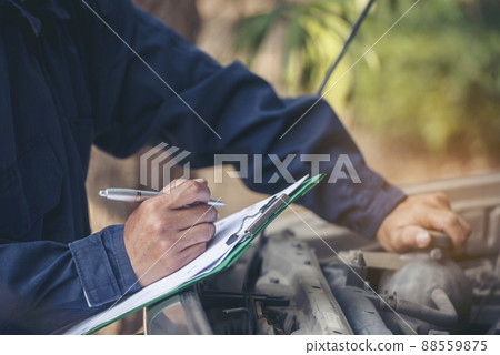 Mechanic car service auto garage in automotive mobile center. Technician workshop repair engine motor vehicles service mechanical engineering business. Automobile mechanic hands car repairs technic Mechanic car service auto garage in automotive mobile center. Technician workshop repair engine motor vehicles service mechanical engineering business. Automobile mechanic hands car repairs technic 88559875