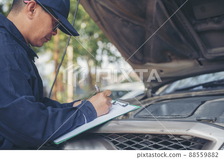 Mechanic car service auto garage in automotive mobile center. Technician workshop repair engine motor vehicles service mechanical engineering business. Automobile mechanic hands car repairs technic Mechanic car service auto garage in automotive mobile center. Technician workshop repair engine motor vehicles service mechanical engineering business. Automobile mechanic hands car repairs technic 88559882