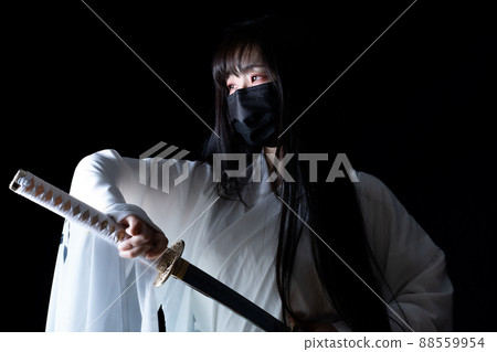 Woman cosplaying as a samurai 88559954