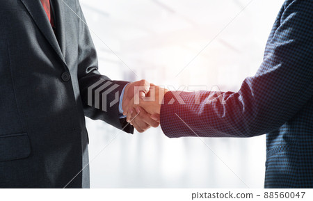 Close-up of the handshake of businessmen. 88560047