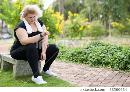 Woman Resting After Run Woman Resting After Run 88560684
