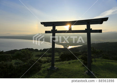 Torii and sun dogs seen from Iozan Shrine in Kaminokuni Town, Hokkaido Torii and sun dogs seen from Iozan Shrine in Kaminokuni Town, Hokkaido 88561898