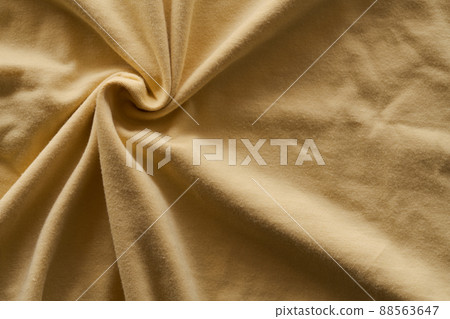 closeup shot of yellow premium cotton fabric closeup shot of yellow premium cotton fabric 88563647