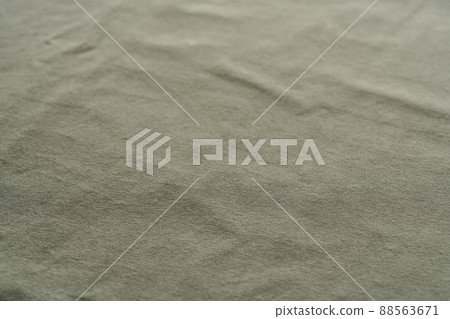 closeup shot of green premium cotton fabric closeup shot of green premium cotton fabric 88563671
