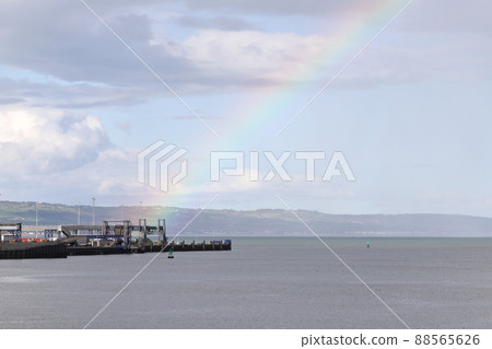 Belfast Harbour Rainbow.  A rainbow is pictured over Belfast harbour.  Belfast Harbour is Northern Ireland's main maritime gateway. 88565626