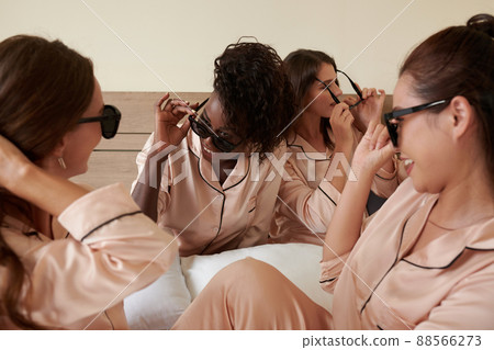 Women Fooling Around at Pajama Party Women Fooling Around at Pajama Party 88566273